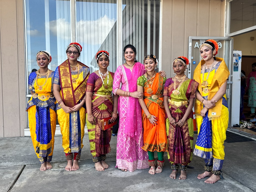 Tanvika Karupakula with fellow dancers and guru