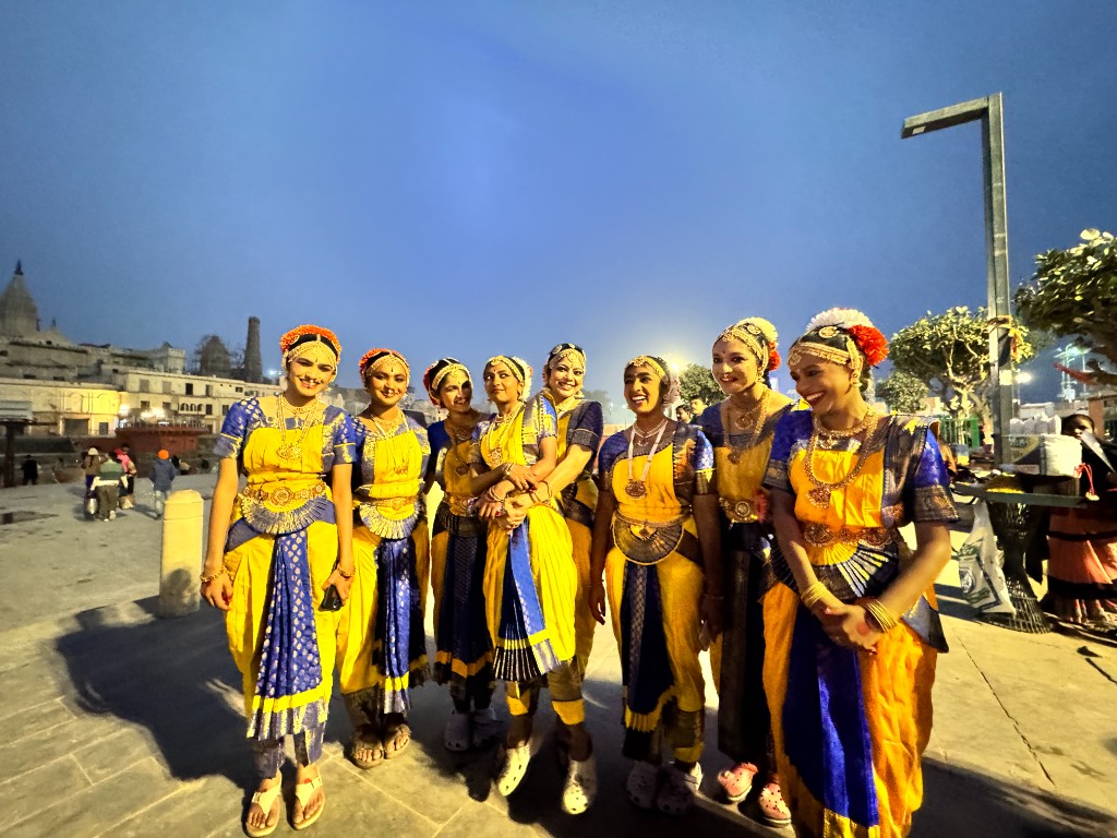 Group of Bharatanatyam dancers at dusk